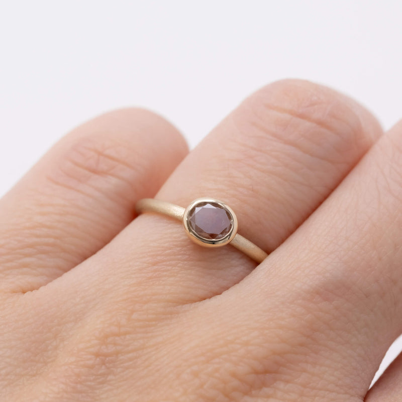 Peach oval diamond ring