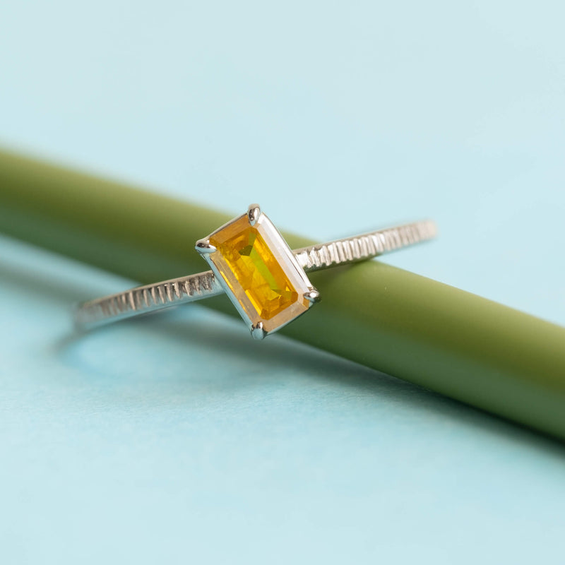 Emerald cut Honey Yellow diamond ring