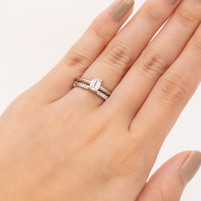 Emerald cut diamond knife edge ring