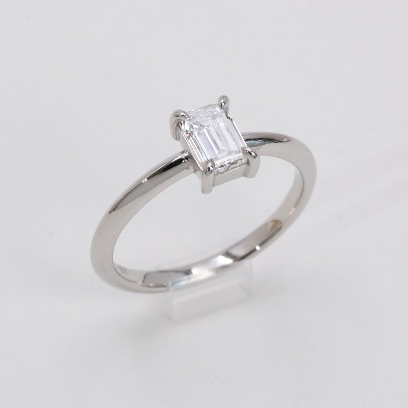 Emerald cut diamond knife edge ring