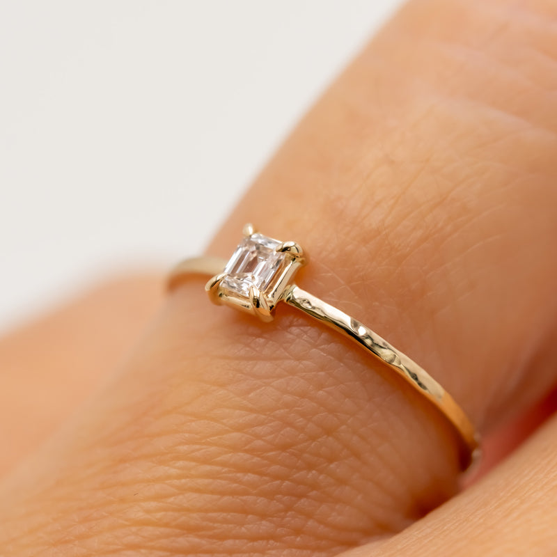 Emerald cut diamond harmony ring