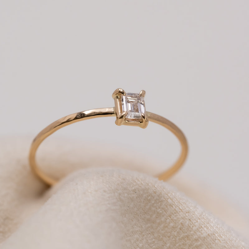 Emerald cut diamond harmony ring