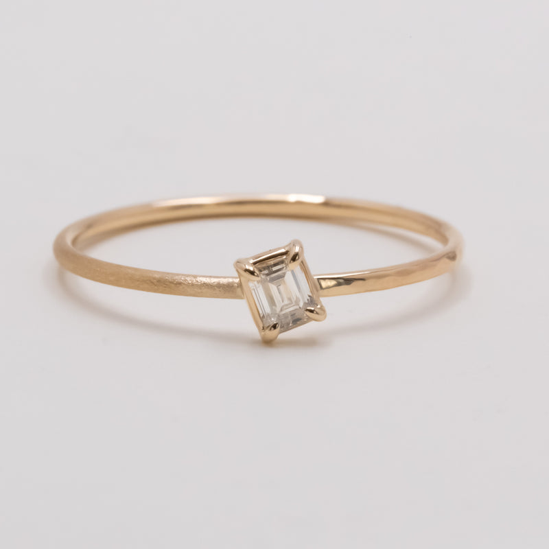 Emerald cut diamond harmony ring