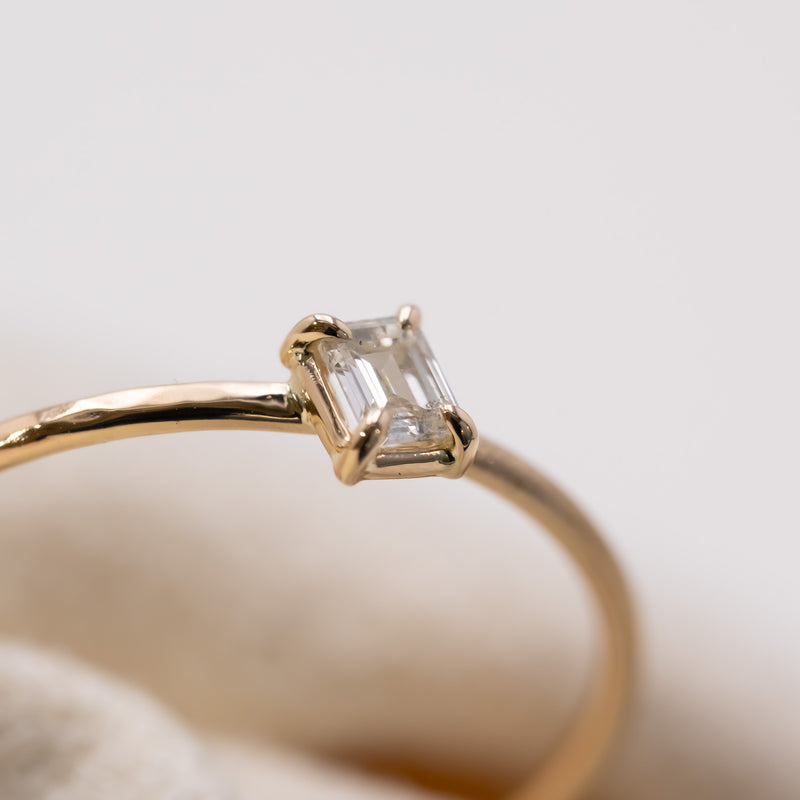 Emerald cut diamond harmony ring