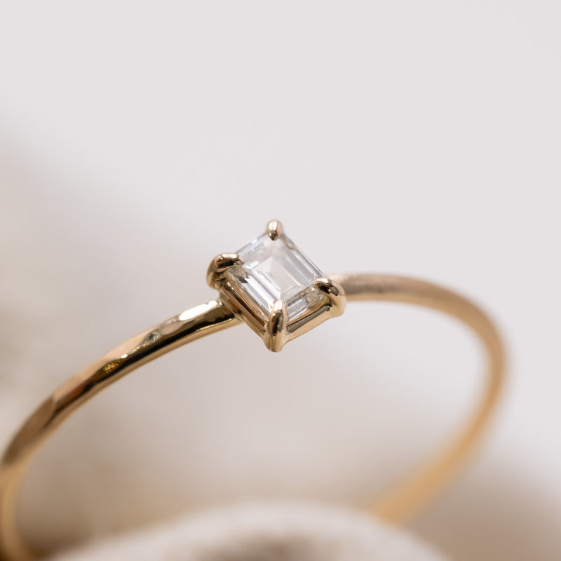 Emerald cut diamond harmony ring