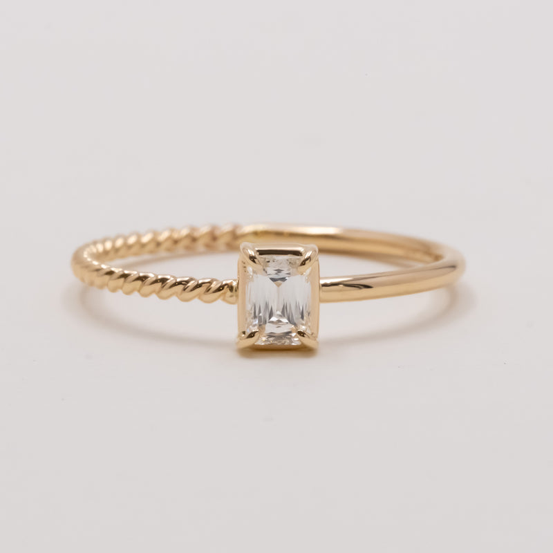 Emerald cut diamond harmony ring