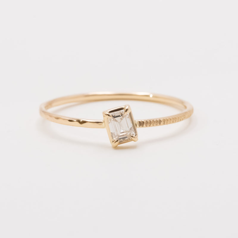 Emerald cut diamond harmony ring