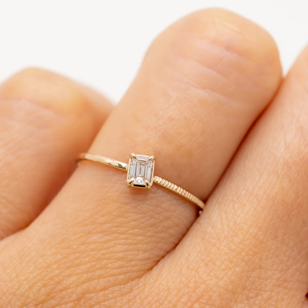 Emerald cut diamond harmony ring