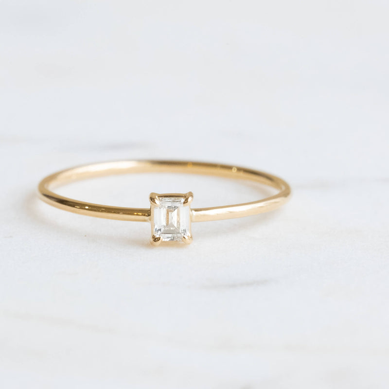 Emerald cut diamond ring