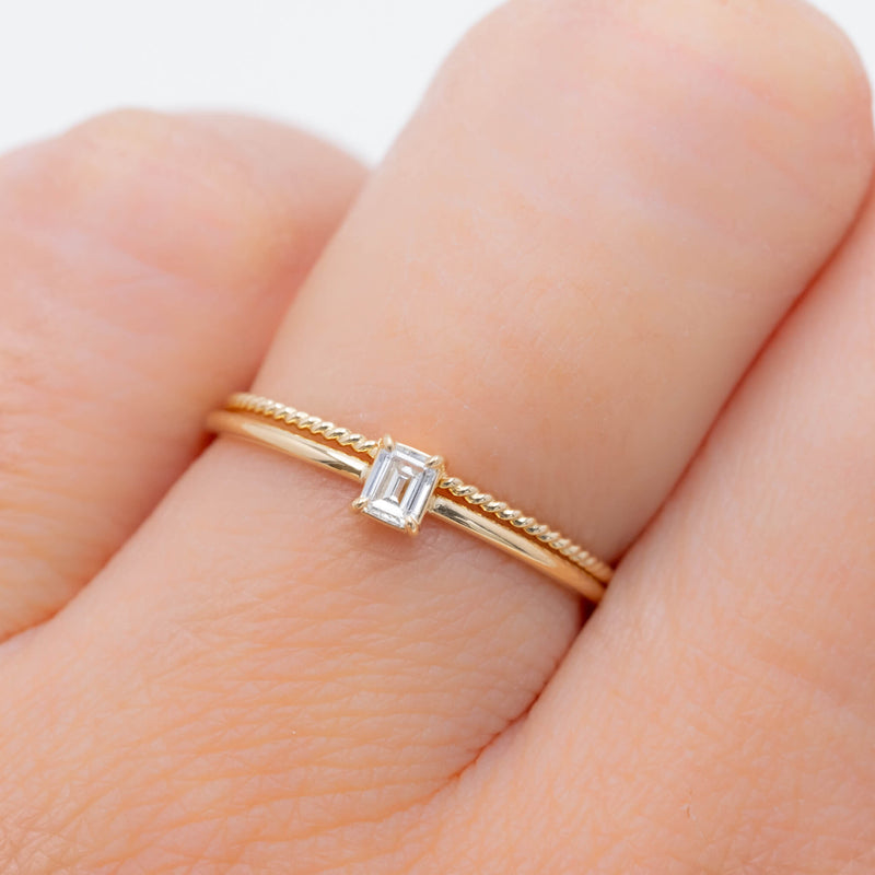 Emerald cut diamond ring